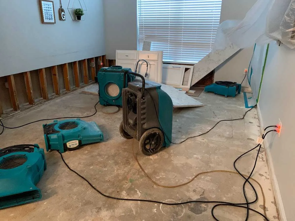 Dehumidifier in flood-cut room for Water Damage Restoration in Faribault